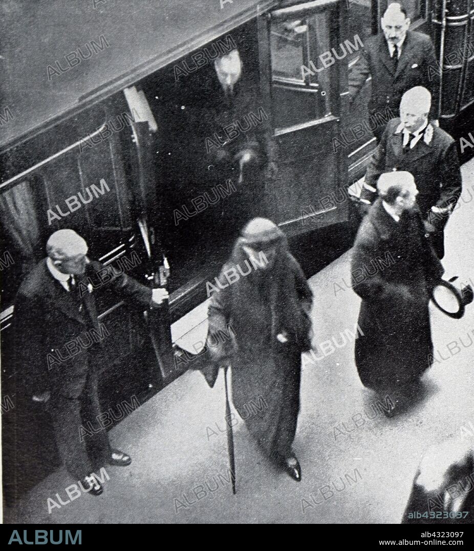 Queen Mary, consort of the late King George V, arrives at King's Cross station London. Funeral of King George V (1936), King of the United Kingdom and the British Dominions, and Emperor of India, from 6 May 1910 until his death in 1936. the four sons of the late king (King Edward VIII, the Duke of York, the Duke of Gloucester and the Duke of Kent) take part in the state funeral.