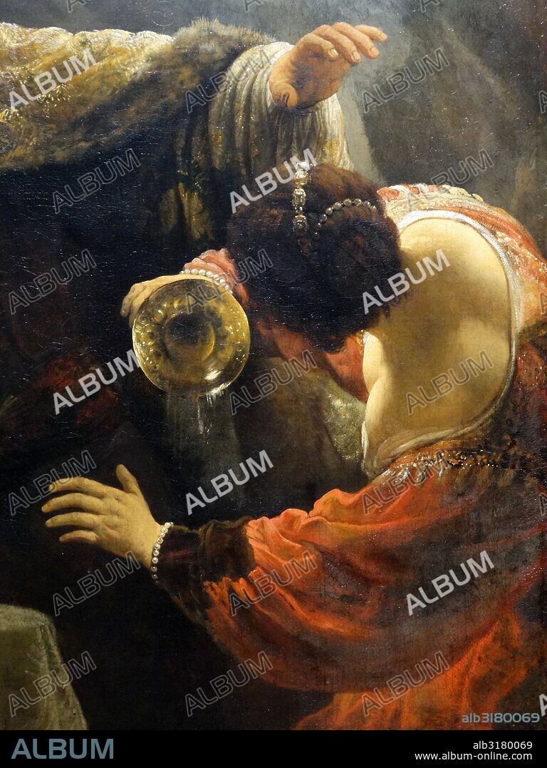 Deatil from Belshazzar's Feast 1635; painting by Rembrandt van Rijn 1606 - 1609. The story of Belshazzar and the writing on the wall originates in the Old Testament Book of Daniel. The Babylonian king Nebuchadnezzar looted the Temple in Jerusalem and has stolen the sacred golden cups. His son Belshazzar used these cups for a great feast where the hand of God appeared and wrote the inscription on the wall prophesizing the downfall of Belshazzar's reign.