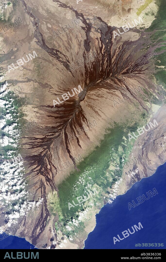 Mauna Loa, as seen by the Operational Land Imager (OLI) on the Landsat 8 satellite, February 9, 2016. Moku'aweoweo Crater is in the center. Dried lava flows surround the two main rift zones. Mauna Loa is the largest volcano on Earth.