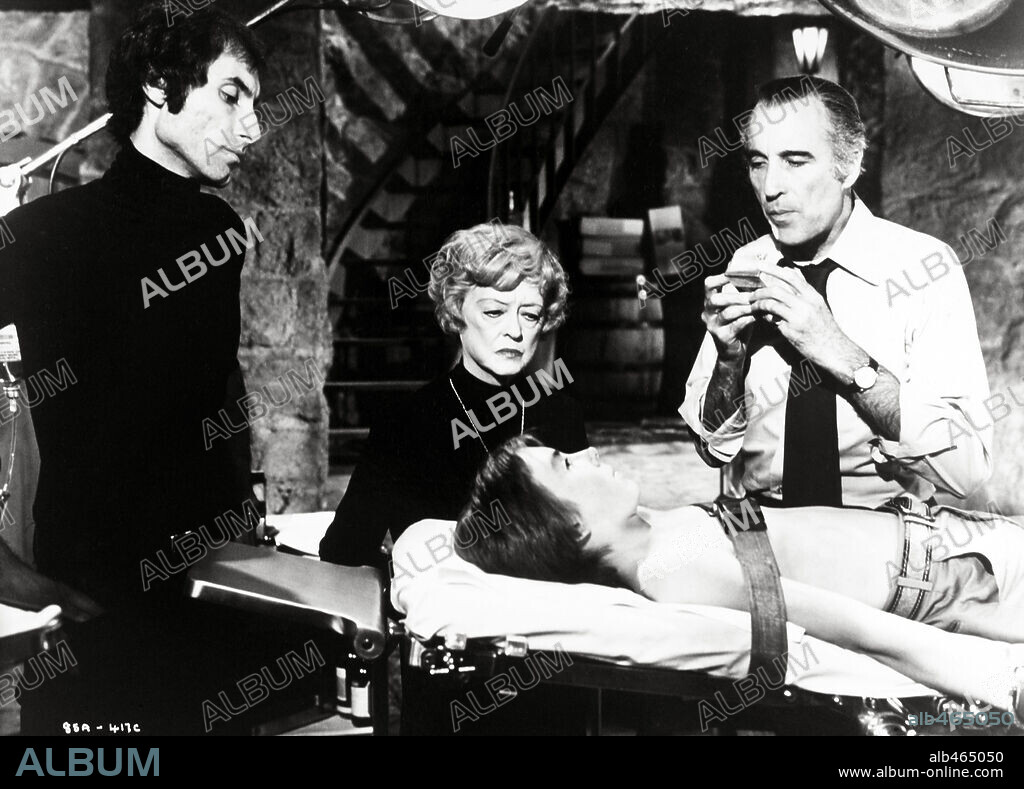ANTHONY JAMES, BETTE DAVIS, CHRISTOPHER LEE and IKE EISENMANN in RETURN FROM WITCH MOUNTAIN, 1978, directed by JOHN HOUGH. Copyright WALT DISNEY PICTURES.