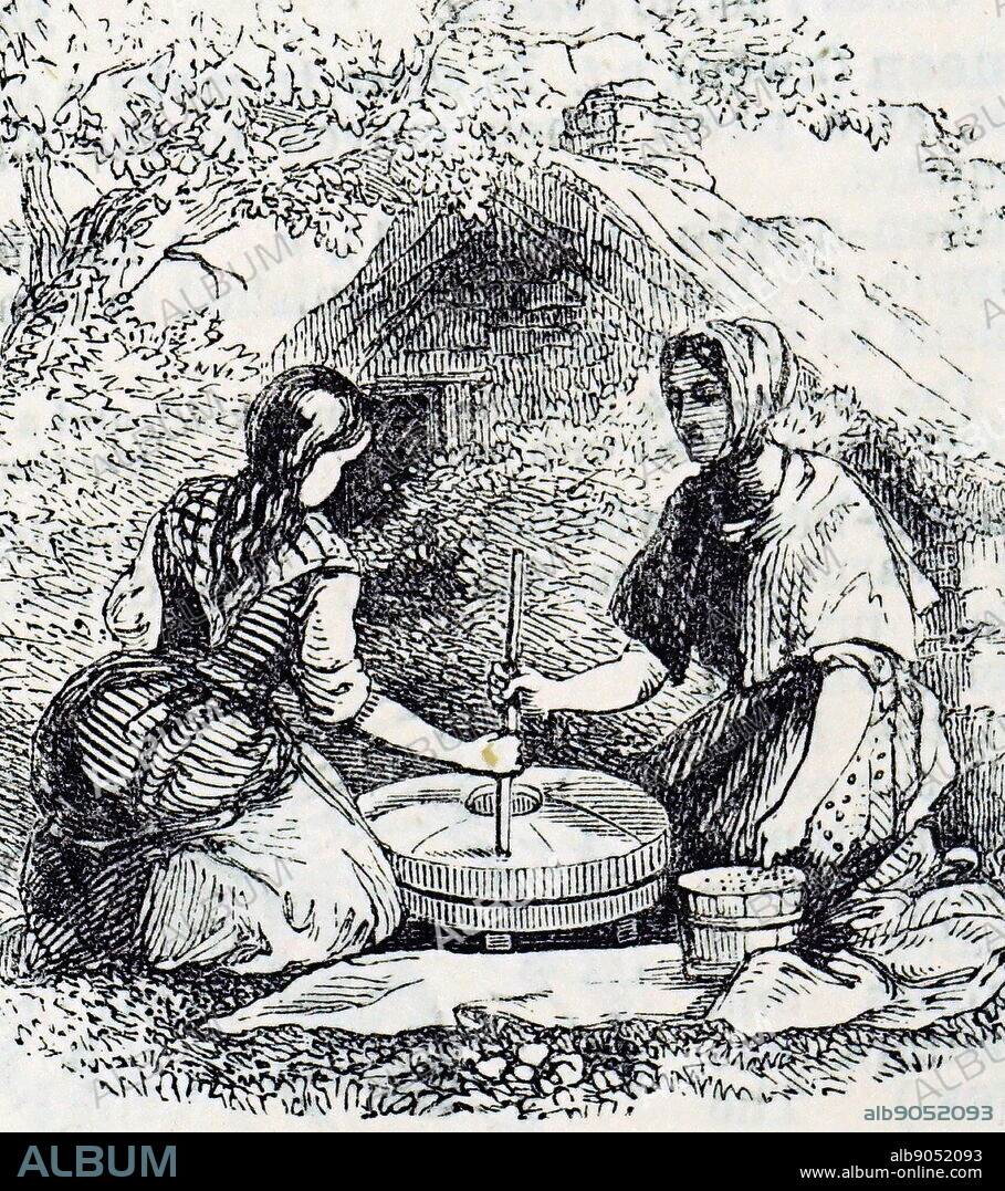 Engraving depicting women grinding corn with a quern. A quern is a simple hand mill for grinding corn, typically consisting of two circular stones, the upper of which is rotated or rubbed to and fro on the lower one. Dated 19th century.