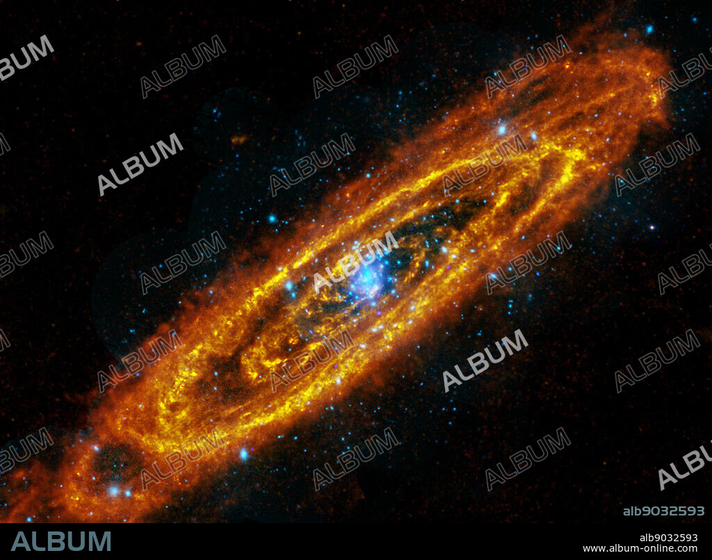The Andromeda Galaxy, M31, is a spiral galaxy a mere 2.5 million light-years away. Two space-based observatories have combined to produce this intriguing composite image of Andromeda, at wavelengths outside the visible spectrum. The view follows the locations of this galaxy's once and future stars. In reddish hues, image data from the large Herschel infrared observatory traces enormous lanes of dust, warmed by stars, sweeping along Andromeda's spiral arms. The dust, in conjunction with the galaxy's interstellar gas, comprises the raw material for future star formation.