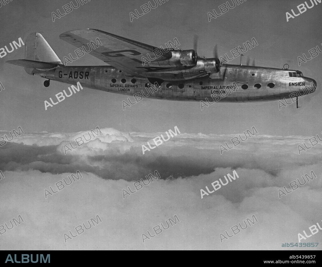 Britain's Largest Landplane Airliner -- First passenger flights, with more than thirty on board, have just been successfully completed at Croydon by "Ensign", leader of the new fleet of 14 Armstrong Whitworth 40-passenger all-metal airliners of the "E" class. These 21-ton craft are to go into service on Empire and European routes. Luxury travel at a top speed of more than 200 miles an hour (320 km./h.) is provided by the "Ensign" which enjoys "four-engine safety" with four Armstrong Siddeley Tig.