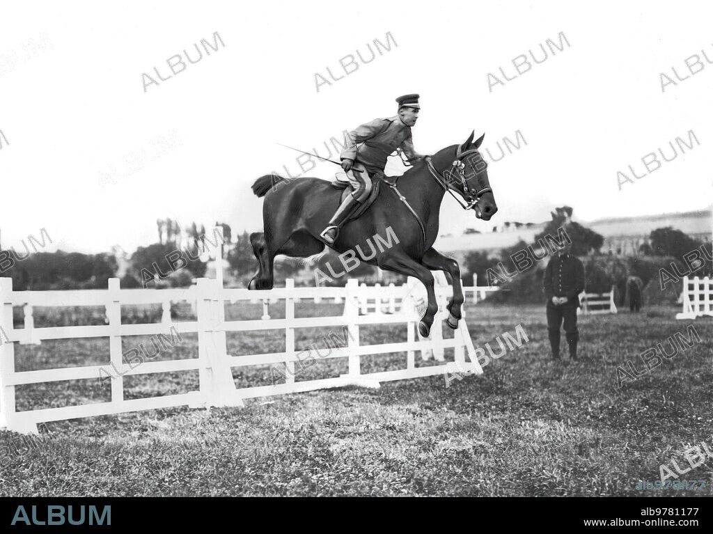 June 1914. Equestrian competition in Madrid. The Horse "Celador" ridden by Don Benito Vecino, when jumping from a palisade in the "Despedida" Test. Photo: duke.