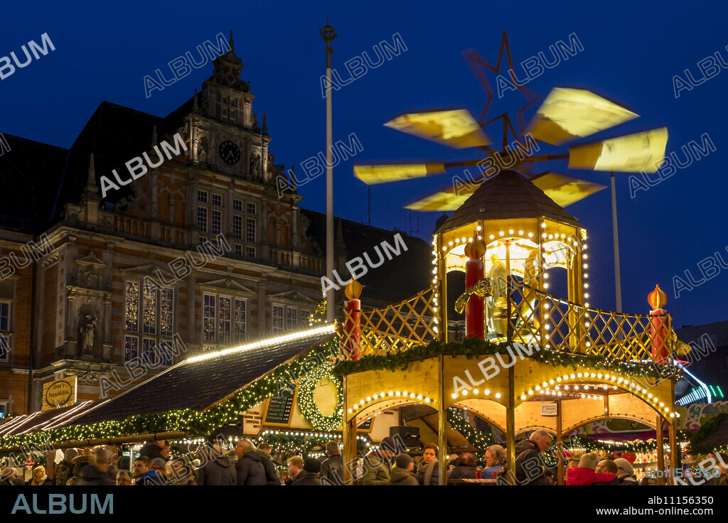 Christmas market at the town hall square at dusk in Harburg, a district of Hamburg, Germany, Europe.