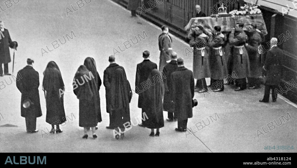 Queen Mary, the Princess Royal and the daughter's in law of the late King George V, wait for his coffin at King's Cross station London. Funeral of King George V (1936), King of the United Kingdom and the British Dominions, and Emperor of India, from 6 May 1910 until his death in 1936. the four sons of the late king (King Edward VIII, the Duke of York, the Duke of Gloucester and the Duke of Kent) take part in the state funeral.