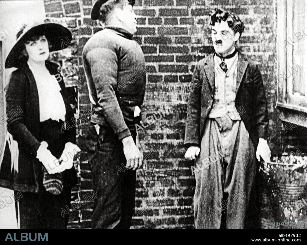 CHARLIE CHAPLIN in THE KID, 1921, directed by CHARLES CHAPLIN. Copyright FIRST NATIONAL.
