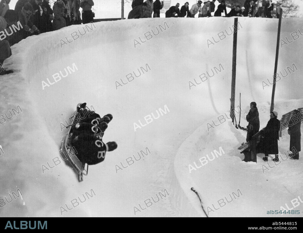 The Slippery Death. A Sign at the top of the St. Moritz, Switzerland, bobsleigh run reads. "Anyone going down the bob run does so at his own risk. The club declines all responsibility." Next to it is another one which states that, "insurance against accidents can be contracted here". The insurance rates are high because accidents are all too frequent at St. Moritz. The bobsleigh run, which is only a mile long, is known as the "slippery death" among the locals  and rightly so because sudden death lurks behind every one of the tortuous hairpin bends which are the special feature of the run. The bobsleighs weigh anything up to half a ton, and reach speeds in excess of 80 mph. March 29, 1937. (Photo by Sport & General Press Agency, Limited).