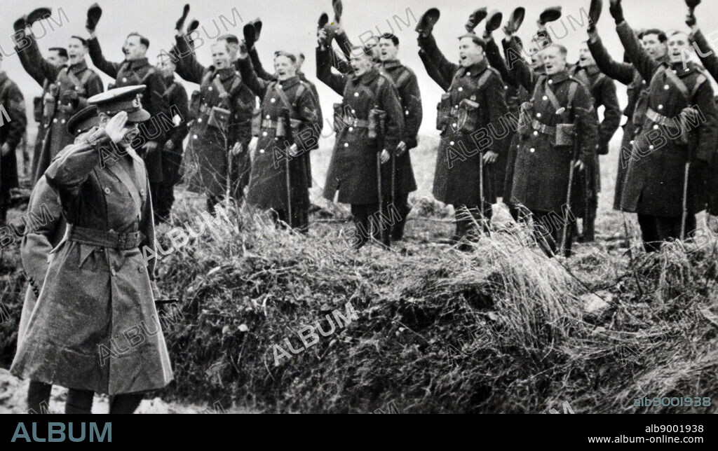 King George VI of Britain greeted by British soldiers in France during the battle for France 1940.