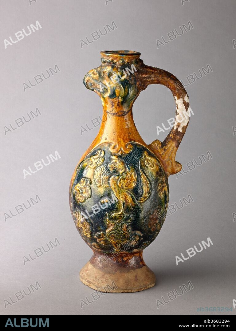 TANG DYNASTY CHINESE. Phoenix-head ewer, Tang sancai ware. Artist: Chinese , Tang Dynasty. Culture: Chinese. Dimensions: Height: 13 in (33 cm.). Date: late 7th century-first half 8th century.