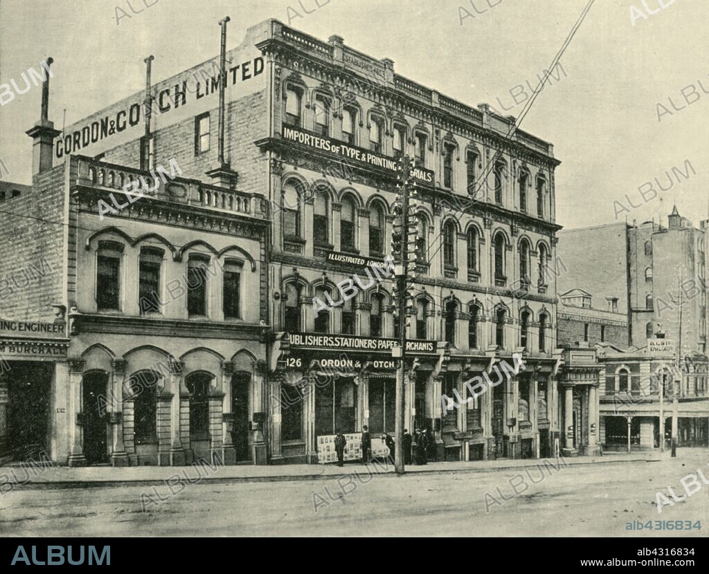 'Queen Street, Melbourne', 1901. Laid out in 1837, Queen Street forms part of the original Hoddle Grid, Gordon & Gotch established a five-storey bookbinding and printing factory here in 1887. From "Federated Australia". [The Werner Company, London, 1901].