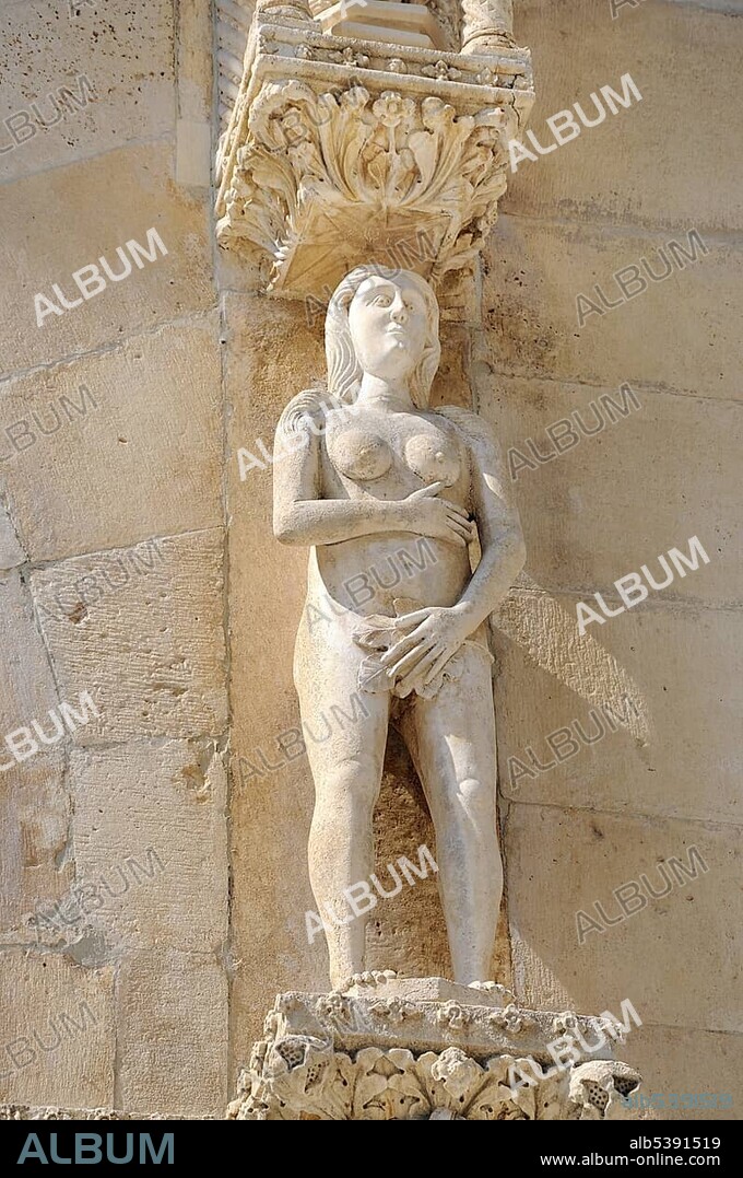 Romanesque portal with a statue representing Eve on the Cathedral of St. James in Sibenik, Croatia, Europe.