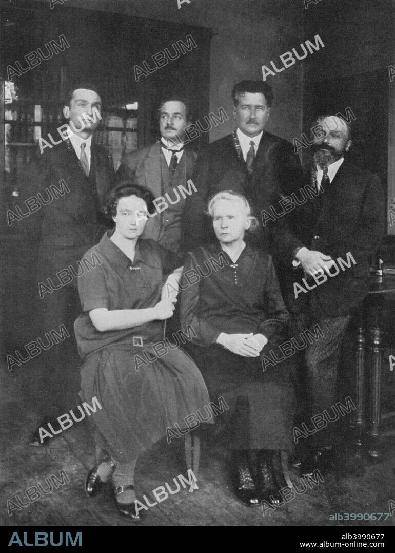 Marie Curie, Polish-born French physicist. Marie Curie (1867-1934) with her daughter Irene Joliot-Curie (1897-1956) and members of the Institute of Radium, Paris. On the right is their co-worker Andre Debierne, who discovered the element actinium in 1909. Marie and her husband Pierre Curie continued the work on radioactivity started by Henri Becquerel. In 1898, they discovered two new elements, polonium and radium. Marie did most of the work of producing these elements, and to this day her notebooks are still too radioactive to use. She went on to become the first woman to be awarded a doctorate in France, and continued her work after Pierre's death in 1906. In 1903 the Curies shared the Nobel Prize for Physics with Becquerel. Marie won a second Nobel Prize, for chemistry, in 1911. Irene followed her parents into science, winning the Nobel Prize for Chemistry in 1935 for her work on the synthesis of new radioactive elements.
