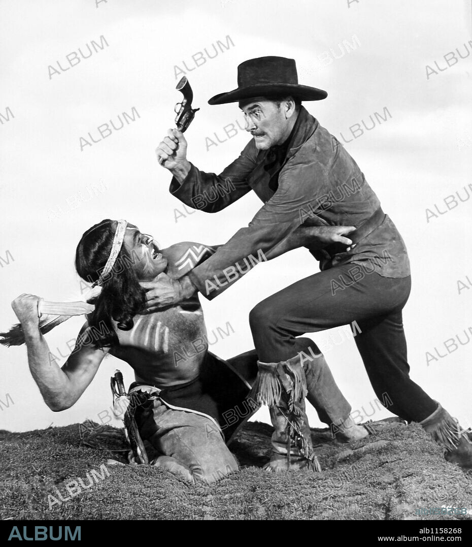 ERROL FLYNN en CERCO DE FUEGO, 1950 (ROCKY MOUNTAIN), dirigida por WILLIAM KEIGHLEY. Copyright WARNER BROTHERS.