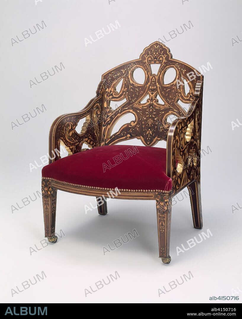 OWEN CARTER JONES. Armchair. Designed by Owen Jones; English, 1809-1874; Made by Jackson & Graham; London, c. 1840-85. Date: 1867-1870. Dimensions: 96.5 × 63.5 × 76.2 cm (38 × 25 × 30 in.). Mahogany, purpleheart, ebony, harewood, holly, and brass. Origin: London.
