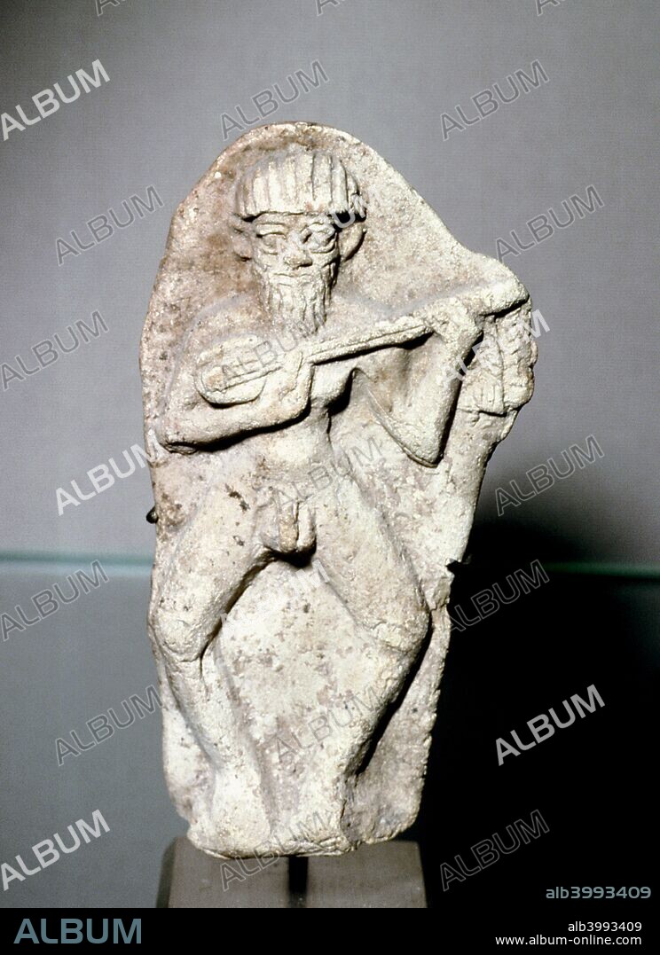 Terracotta figurine of a male musician, Susa, Iran, Middle Elamite period, 1500-1100 BC. From The Louvre.