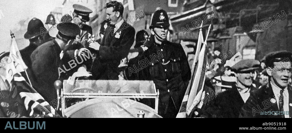 Photograph depicting the arrival of John Alcock and Sir Arthur Whitten Brown in Ireland. Captain John Alcock (1892-1919) and Lieutenant-Colonel Sir Arthur Whitten Brown (1886-1948) together flew the first non-stop transatlantic flight. Dated 20th Century.
