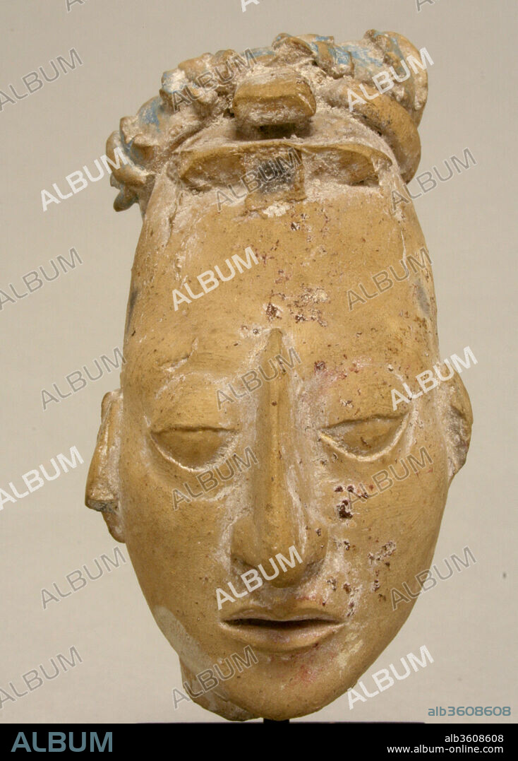 Head from a Figure. Culture: Maya. Dimensions: H. 3 3/8 x W. 1 7/8 x D. 2 1/2 in. (8.6 x 4.8 x 6.4 cm). Date: 7th-8th century.