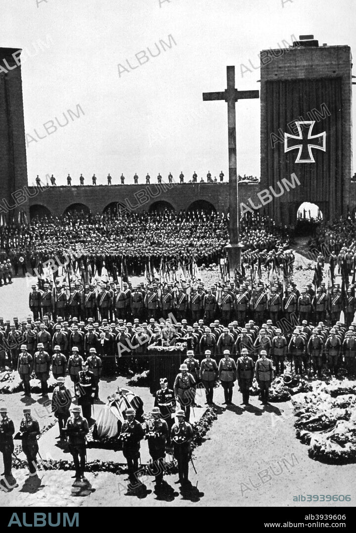 State funeral of President Paul von Hindenburg, Tannenberg, Germany, 1934. Field Marshal Paul von Hindenburg (1847-1934) served as Germany's president from 1925 until his death. Tannenberg was the site of his great victory over the Russians in the early days of World War I. With Hindenburg dead, Hitler was able to assume absolute power as Fuehrer (leader) and Chancellor of Germany. A print from Adolf Hitler. Bilder aus dem Leben des Führers', Hamburg: Cigaretten/Bilderdienst Hamburg/Bahrenfeld, 1936.
