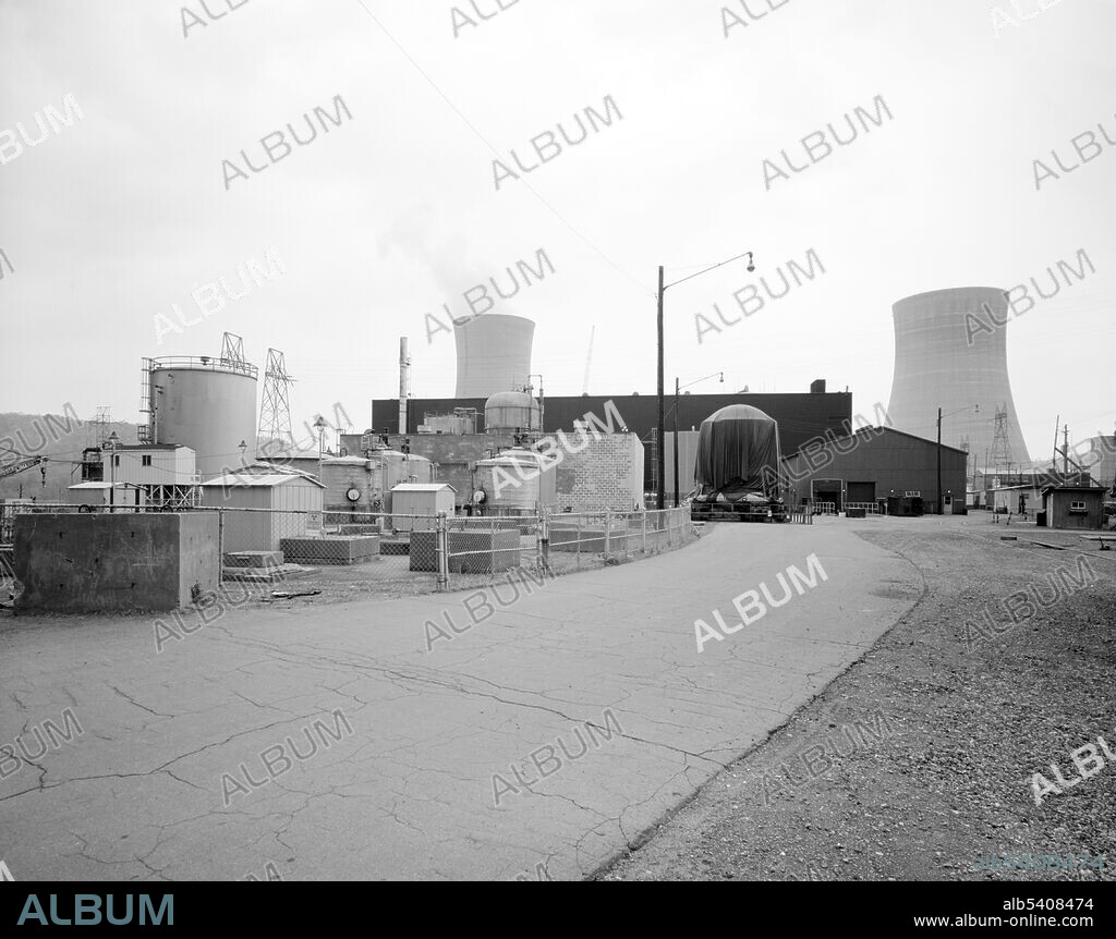 West side view of the Shippingport Atomic Power Station, c. 1977. Shippingport was the first full-scale nuclear electric power plant in the world. It operated between 1957 and 1982. The site is located on the Ohio River, 25 miles Northwest of Pittsburgh, Shippingport, Beaver County, PA.