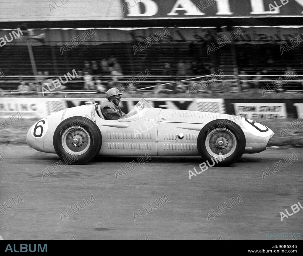 Prince Bira driving a Maserati during practice at Silverstone for the British Grand Prix. 16 July 1954.