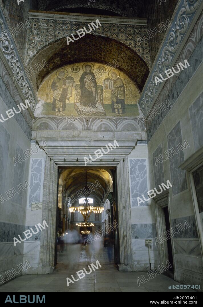 Turkey, Istanbul. Hagia Sophia. Southwest vestibule. Mosaic in the tympanum. Dated during the reign of Basil II (c.958-1025). The Virgin and Child in the center. To her left, Justinian I presenting a model of Hagia Sophia. To her right, emperor Constantine.