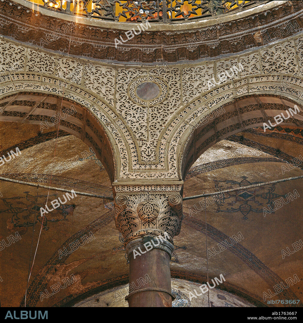 Haghia Sofia Basilica, by Isidore of Miletus known as Isidore of Miletus the Older, 532-537 ante, 6th Century,. Turkey, Istanbul, Istanbul, Hagia Sofia Basilica. Hagia Sophia Basilica interior detail springer capital arches north east exedra carved marble fretwork leaves volutes, photo 2009.