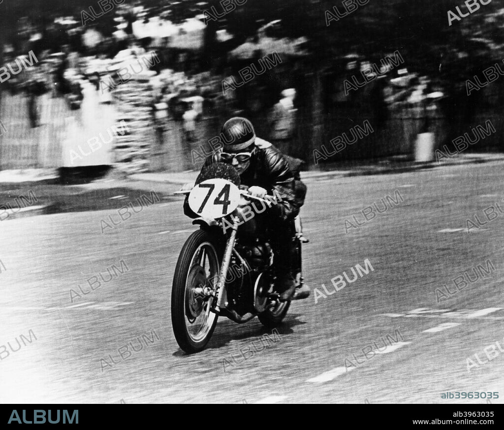 M Barrington on a Moto Guzzi bike, Isle of Man TT, 1949. Barrington was the winner of the 250cc class.