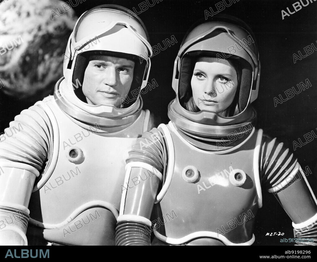 CATHERINE SCHELL and JAMES OLSON in MOON ZERO TWO, 1969, directed by ROY WARD BAKER. Copyright HAMMER/WARNER BROTHERS.