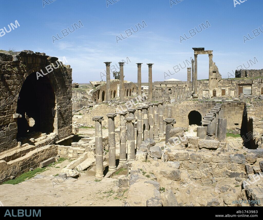 Syria, Bosra. Ruins of the Roman baths and the archaeological city. Photo taken before the Syrian civil war.
