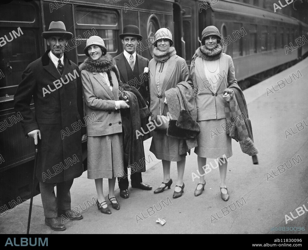 Lord Lytton returns to London . The Earl and Countess of Lytton with their two daughters and son photographed on arrival at Victoria . 25 April 1927.