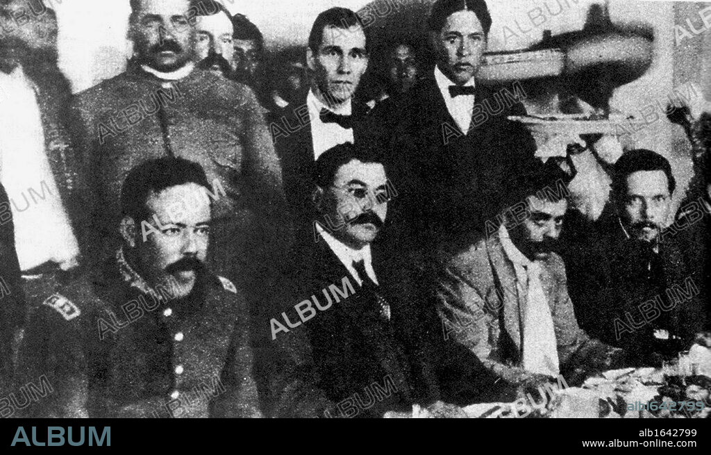 Seated, from left to right, Doroteo Arango Arambula (1878-1923) known as Pancho Villa, Mexican revolutionary general, Eulalio Gutierrez (1881-1939) Mexican politician, President of Mexico 1914-1915, Emiliano Zapata (1879-1919) Mexican Revolutionary leader, and Felicitas Villareal. 1914 .
