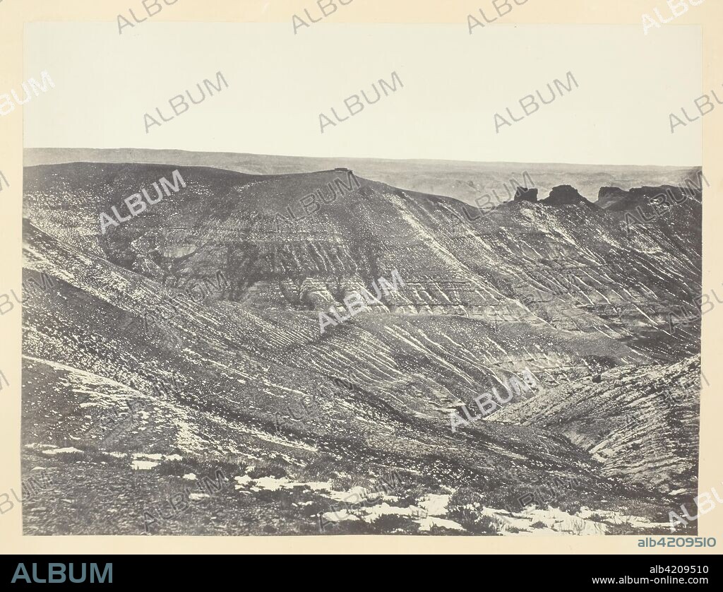 ANDREW JOSEPH RUSSELL. Bitter Creek Valley, Near Green River. Andrew J. Russell; American, 1830-1902. Date: 1868-1869. Dimensions: 15.5 x 20.4 cm (image/paper); 23.2 x 30.3 cm (album page). Albumen print, pl. IX from the album "Sun Pictures of Rocky Mountain Scenery" (1870). Origin: United States.