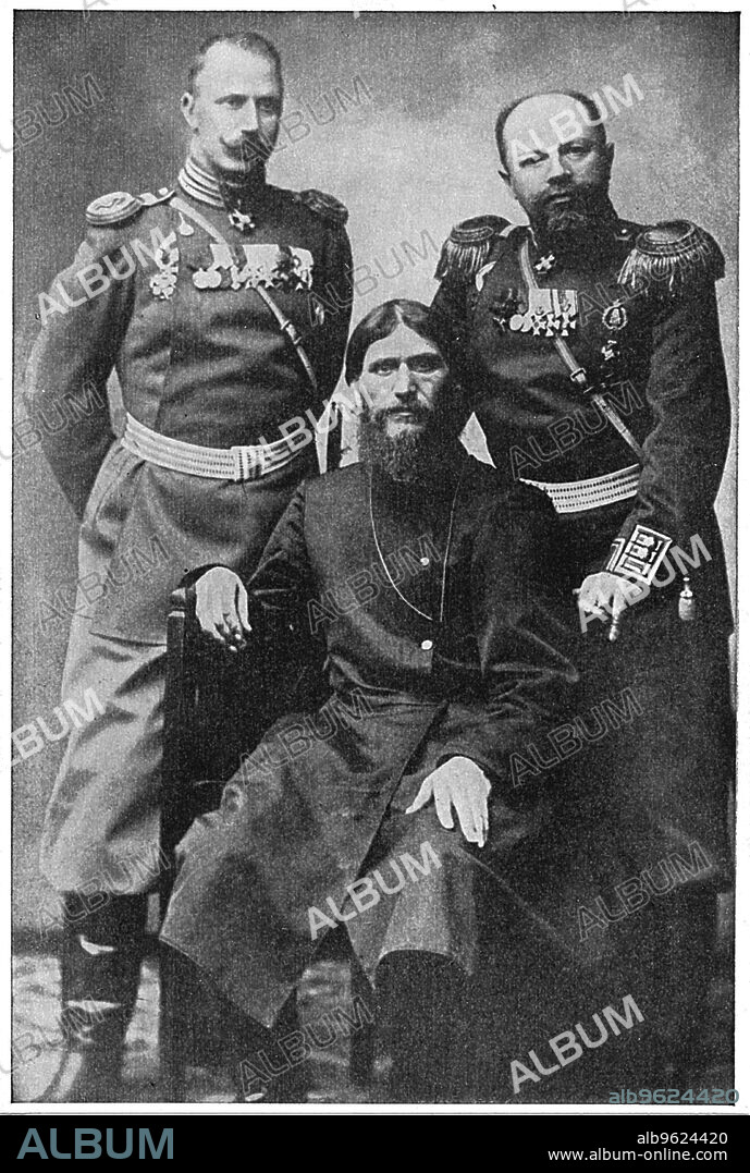 Grigoriy Efimovich Rasputin, Russian mystic and 'holy man'. Rasputin (1869-1916) exercised considerable influence over Tsar Nicholas II and particularly the Tsarina, partly due to their belief in his ability to heal their son's haemophilia. He is shown seated between Colonel Loma (left) and Prince Putianin. Rasputin's influence over the Imperial family was widely unpopular, and he was murdered by Prince Felix Yusupov and Grand Duke Dmitri Romanov on the night of 29/30 December 1916.