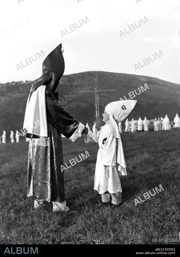 Stone Mountain, Georgia:   July 23, 1948. Klan tykes appear in regalia at the mass initiations into the Ku Klux Klan.