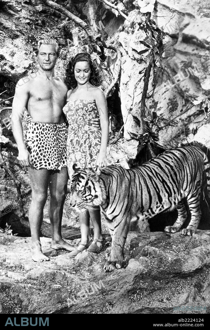 DOROTHY LAMOUR and RICHARD DENNING in BEYOND THE BLUE HORIZON, 1942, directed by ALFRED SANTELL. Copyright PARAMOUNT PICTURES.