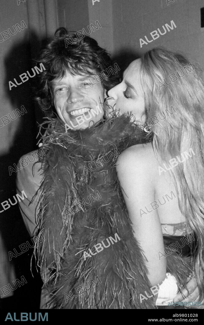 Mick Jagger, Jerry Hall, 80'.