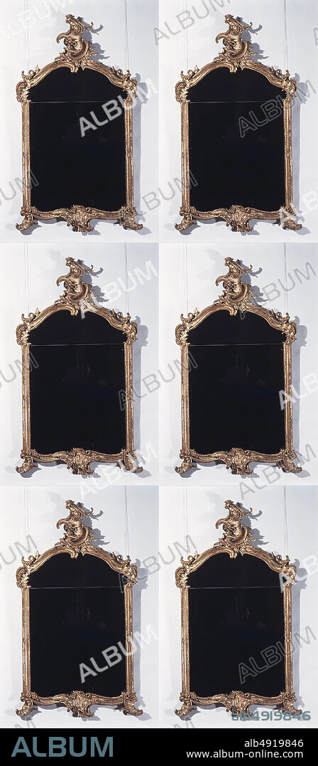 Wall mirror, German, ca. 174050, German, Carved and gilded basswood, glass and pine, Overall: 57 × 33 1/2 × 4 1/2 in. (144.8 × 85.1 × 11.4 cm), Woodwork-Furniture.