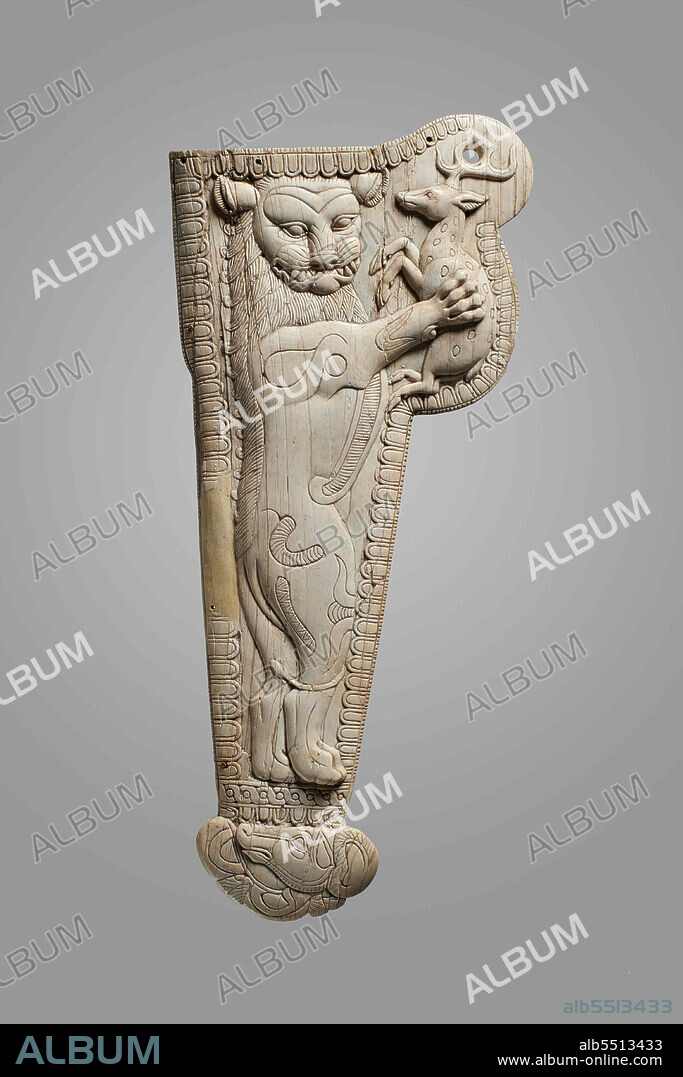 CENTRAL ASIAN ART. Sheath for an akinakes with a lion grasping a deer. From the Oxus Temple, Takht-i Sangin.