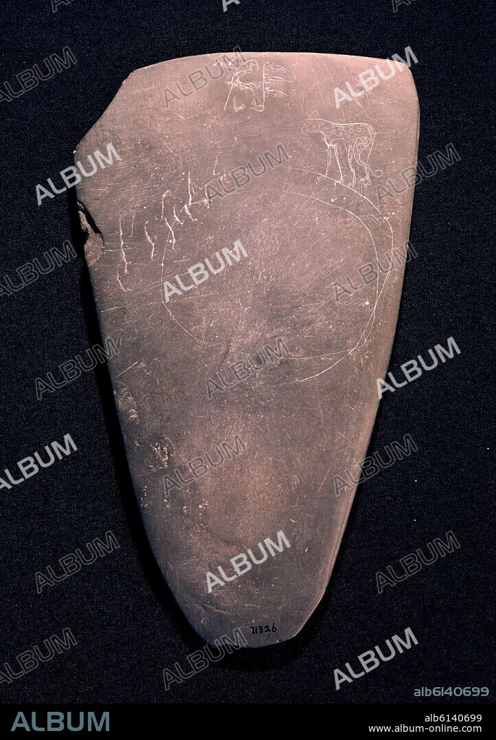 PALETA DE FORMA ESCUTIFORME. EGIPTO NAGADA III 3000 A.C.  PROCEDE DE ABU-UMURI.