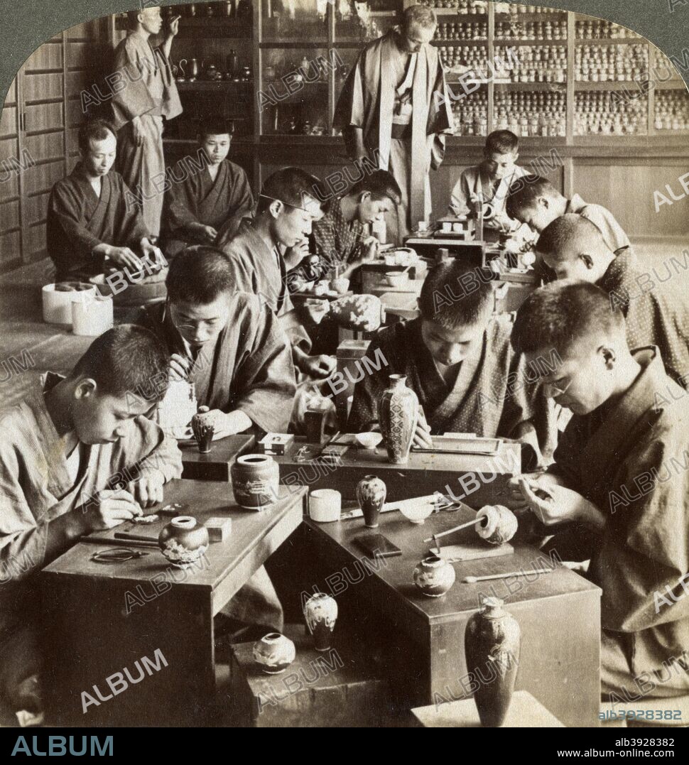 Expert workmen creating designs in cloisonne, Kyoto, Japan, 1904. Mr Namikawa in the background. Stereoscopic card. Detail.