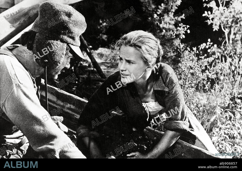 KARL MALDEN and MARIA SCHELL in THE HANGING TREE, 1959, directed by DELMER DAVES. Copyright WARNER BROTHERS.