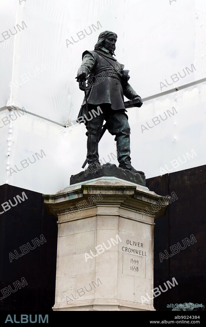 statue of Oliver Cromwell, by Hamo Thornycroft, 1899. Located outside the Palace of Westminster, London. Oliver Cromwell (25 April 1599 - 3 September 1658), was an English military and political leader. He served as Lord Protector of the Commonwealth of England, Scotland, and Ireland from 1653 until his death, acting simultaneously as head of state and head of government of the new republic.