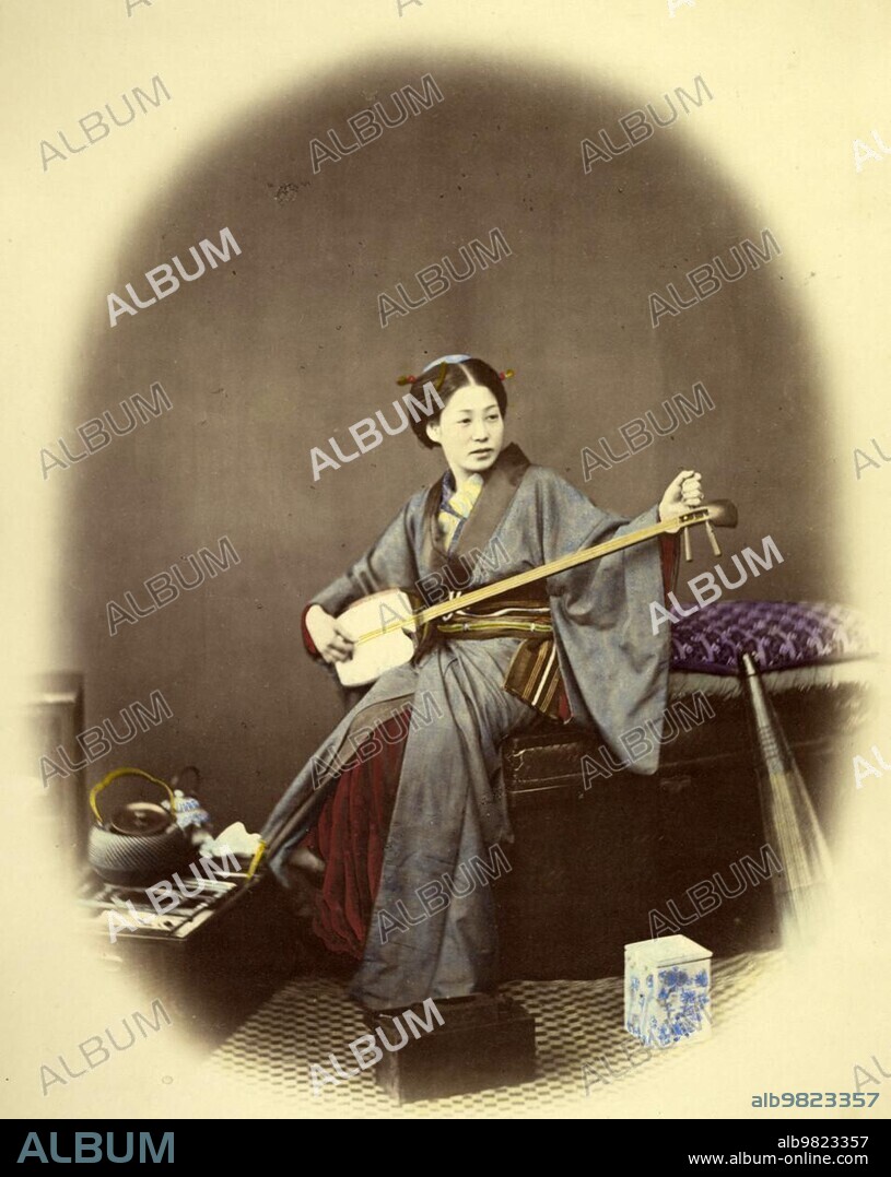 Girl playing the samisen, a three-stringed plucked long-necked lute with a long narrow neck and a relatively small body, 1850, Japan, Historic, digitally restored reproduction from a 19th century original