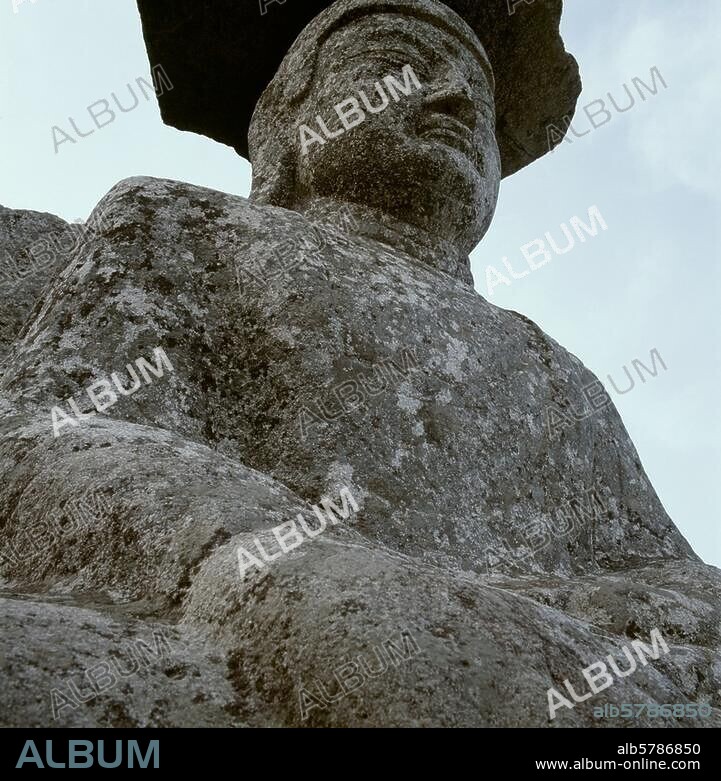 Gwanbong (South Korea), stone statue of the Gatbawi Buddha on the southern peak of Mount Palgongsan. (Buddha of medicine, sculpture, 9th century). Partial view. Photo, undated.