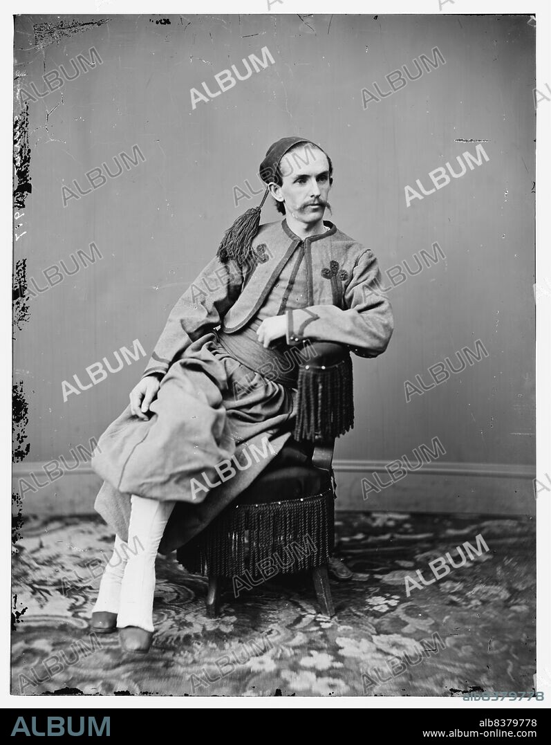 John Surratt, 1867. [John Harrison Surratt Jr. in middle-eastern dress. Involved in an unsuccessful attempt to kidnap US President Abraham Lincoln with the intention of holding him for ransom in exchange for the release of Confederate prisoners of war. His mother, Mary Surratt, was executed for her involvement in the assassination of Lincoln, having given the conspirators accommodation in her boarding house. Surratt denied any involvement in the assassination plot, but fled overseas to avoid arrest. He was apprehended by US officials in Alexandria, Egypt, in November 1866 and was extradited to the United States for trial. He admitted his involvement in the kidnap attempt but continued to deny that he was involved in the assassination. He was eventually released after the case ended up in a mistrial with the statute of limitations having expired on all charges other than murder].