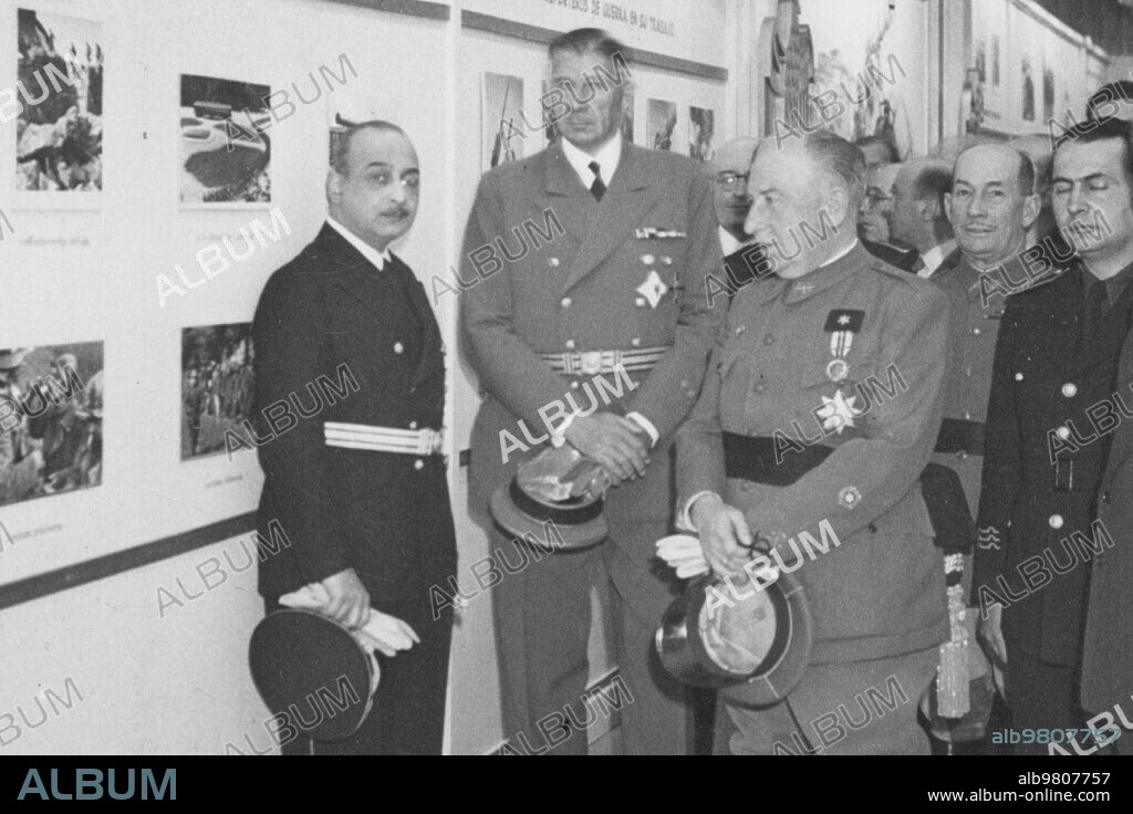 Barcelona, 1941. Inauguration of the German press exhibition in Barcelona in 1941. On the left, the spy and press chief of the German Embassy in Spain, Hans Lazar. In the center, the high ambassador Eberhard von Stohrer, and to the left of him, General Orgaz.