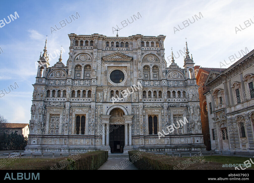 Lombardy, Italy, Europe. The Charterhouse of Pavia, in italian Certosa di Pavia (Gratiarum Carthusia - Monastery of Santa Maria delle Grazie) is a historic monumental complex that includes a monastery and a sanctuary. It is located in the homonymous municipality of Certosa di Pavia, a town some kilometers north of the provincial capital. Pavia. The facade of the church os Santa Maria delle Grazie.