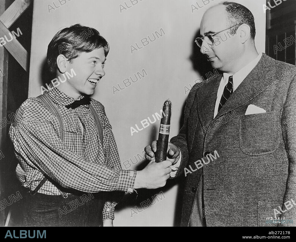 MICKEY ROONEY and NORMAN TAUROG in YOUNG TOM EDISON, 1940, directed by NORMAN TAUROG. Copyright M.G.M.