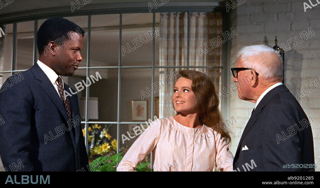 KATHARINE HOUGHTON, SIDNEY POITIER and TRACY SPENCER. KATHARINE HOUGHTON, SIDNEY POITIER and SPENCER TRACY in GUESS WHO'S COMING TO DINNER, 1967, directed by STANLEY KRAMER. Copyright COLUMBIA PICTURES.